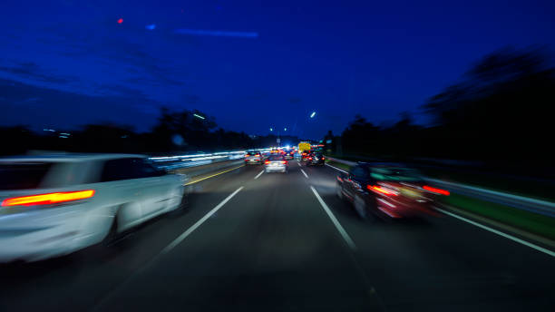 Free Stock Photo of A Car Speeding Down a Highway at Night | Download ...