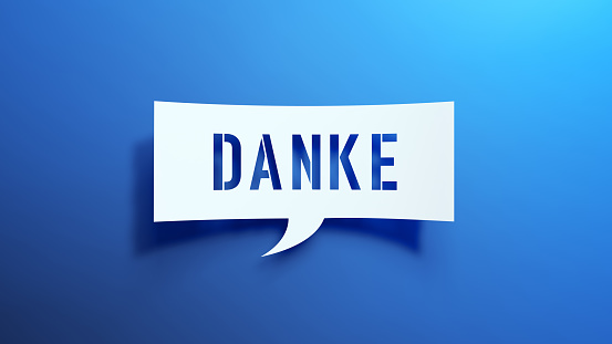 Danke - Speech Bubble. Minimalist Abstract Design With White Cut Out Paper on a Blue Background. 3D Render.