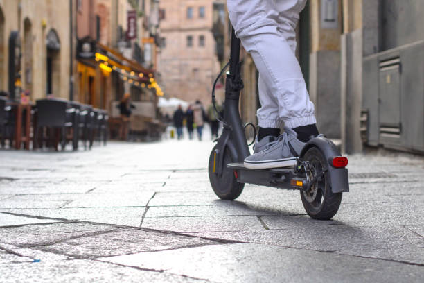 istock Legs up on an electric scooter 1895077249