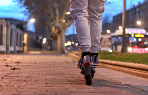 istock Legs up on an electric scooter 1895078735