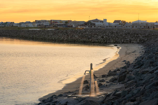 istock Langisandur beach at sunset. Blue Flag beach in Akranes, Iceland. 1895089691