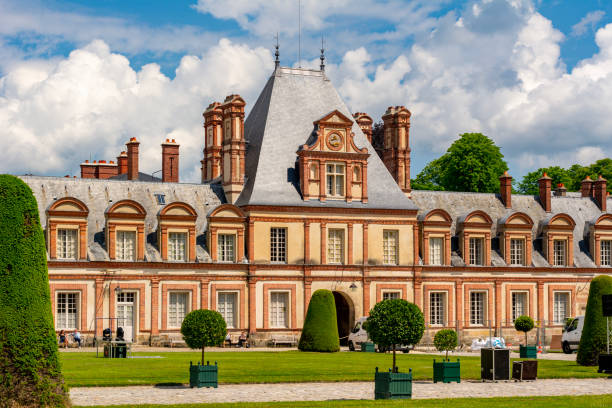 Fontainebleau palace (Chateau de Fontainebleau) outside Paris, France Paris, France - May 2019: Medieval Fontainebleau palace (Chateau de Fontainebleau) outside Paris chateau de fontainbleau stock pictures, royalty-free photos & images