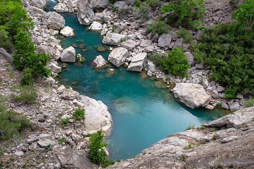 It is one of the sources where the Goksu river, located within the borders of Mersin province in Türkiye, originates.