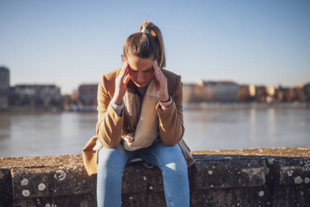 istock Worried woman having headache 1895248436