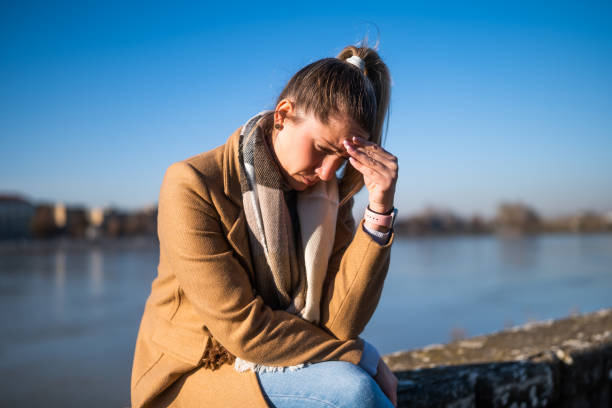 istock Worried woman having headache 1895248441
