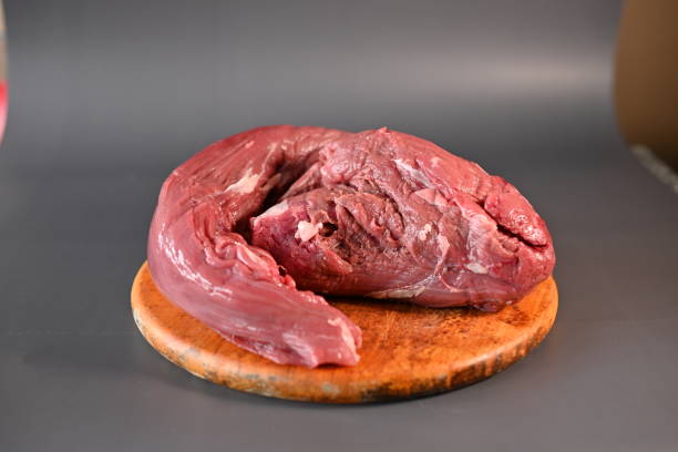 fresh beef tenderloin on a gray background - veal piccata стоковые фото и изображения