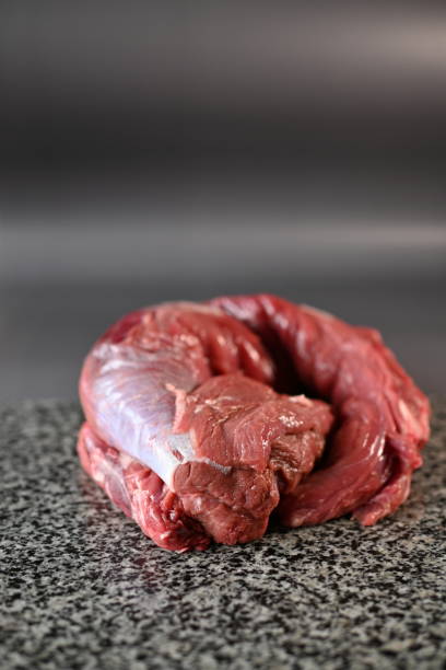 fresh beef tenderloin on a gray background - veal piccata ストックフォトと画像