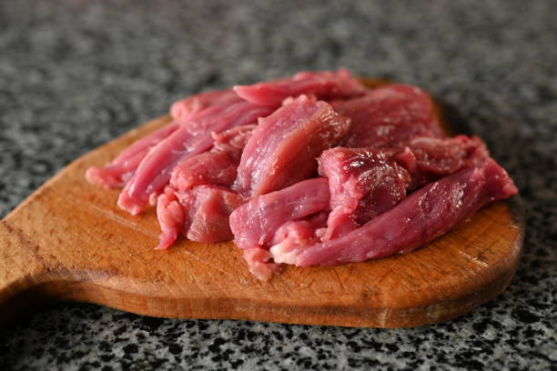 sliced veal strips, beef goulash, red beef meat sliced for cooking - veal piccata ストックフォトと画像