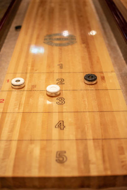 istock Playing the game of shuflleboard.. 1895419161