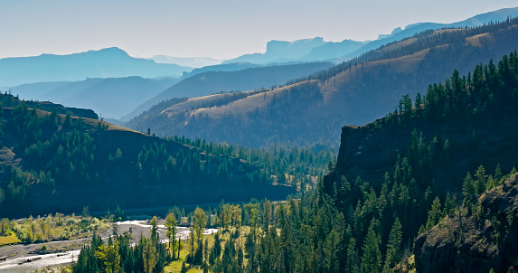 Aerial still of Shoshone National Forest, Wyoming on a clear day in Fall.