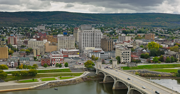 Aerial still of Wilkes-Barre, a city in Luzerne County, Pennsylvania, on an overcast day in Fall.