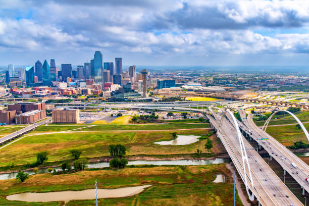 Aerial view of the beautiful modern skyline of Dallas, Texas shot via helicopter from an altitude of about 800 feet.