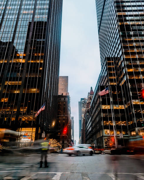 istock Urban canyon: the flow of life and light between Manhattan's giants. 1895472380