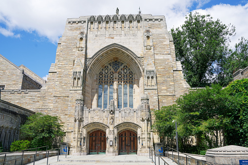 New Haven, Connecticut, United States - July 30, 2023: Gothic architecture is in abundance on the old campus of Yale University in New Haven, Connecticut