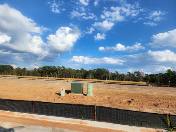 istock New housing development with lots cleared and roads completed.  Utilities have been installed, just awaiting the new construction planned for the area. 1895700315