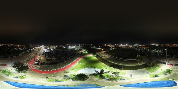 360 aerial photo taken with drone of Brazil themed park at night