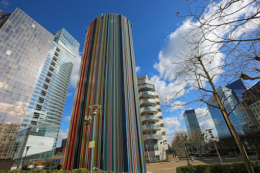 Colorful fiberglass artwork tower of Moretti in La Defense district of Paris, France. Picture made on 26 Feb 2023