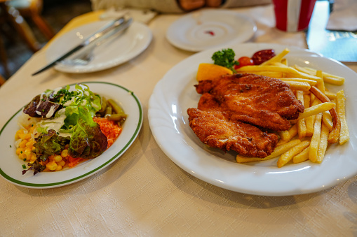 schnitzel and fried potato (cutlet)
