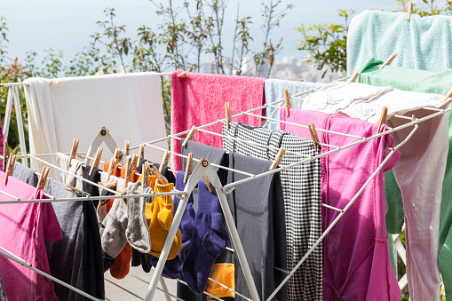 clothes hanging on clothesline outdoors