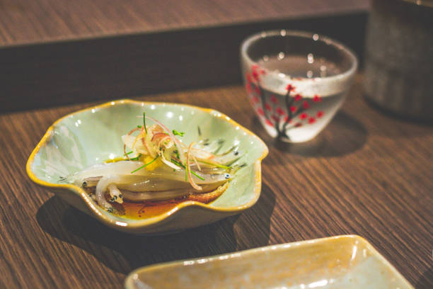 istock appetizer of some japanese white bait fish served in a small dish 1895975412