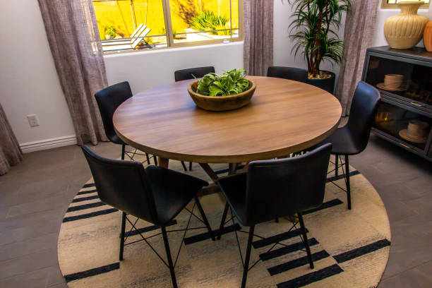 istock Round Wooden Table With Six Chairs In Eating Area 1896013487