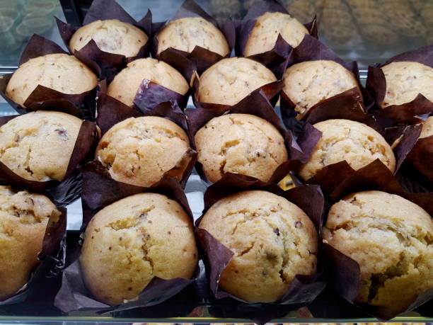 istock Muffins wrapped in a brown paper. 1896073014