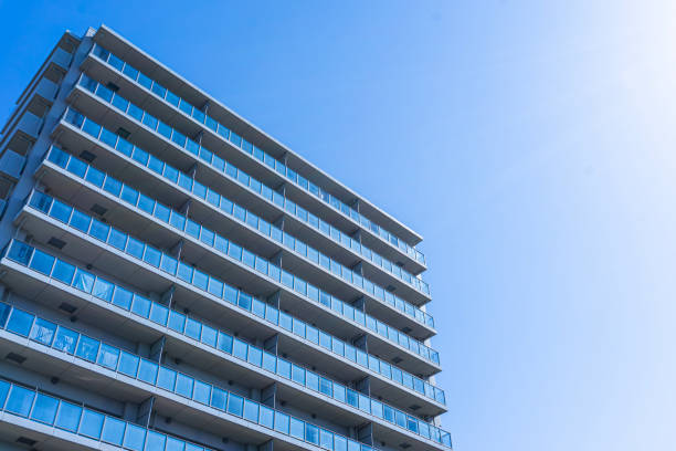 istock Exterior of high-rise condominium and refreshing blue sky scenery 1896120620