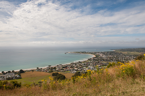 Spectacular ocean, beach, hinterland and Apollo Bay township as scene from Marriners Lookout on the Great Ocean Road