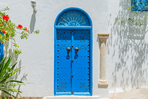 Image of old door in Tunisia. Arabic style architecture.
