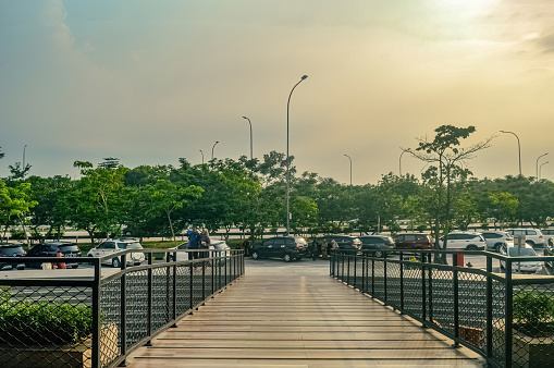 Parking atmosphere at a busy rest area on the Trans Java toll road in the afternoon, Indonesia, 23 December 2023.