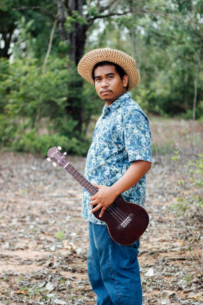 istock young southeast Asian musician 1896259532