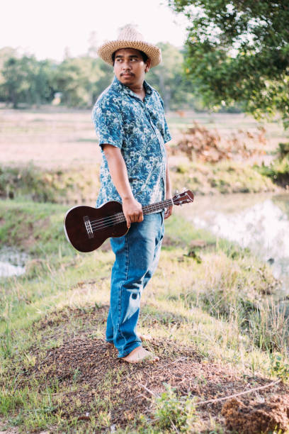 istock young southeast Asian musician 1896262620