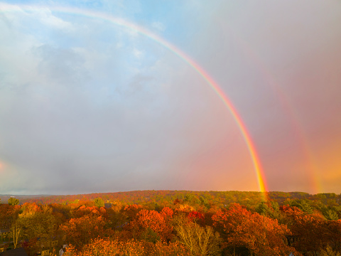 landscape of rainbow in the sky in autumn season