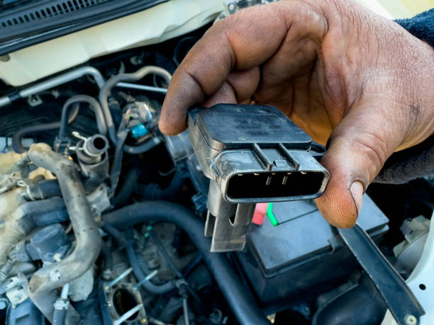 istock Manifold absolute pressure sensor MAP holding in hand for examination 1896406977