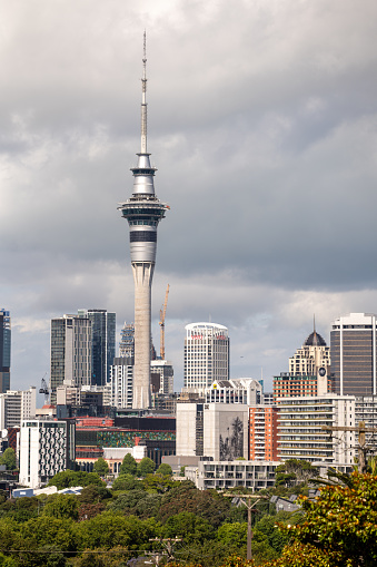 view of auckland city covered in dark clouds