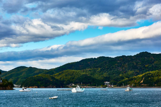 istock Scenic view of bay against moody sky 1896459832
