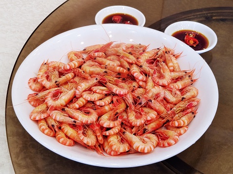 Healthy salad plate. Fresh seafood recipe. Grilled shrimps and fresh vegetable salad and egg. Grilled prawns. Healthy food. Flat lay. Top view