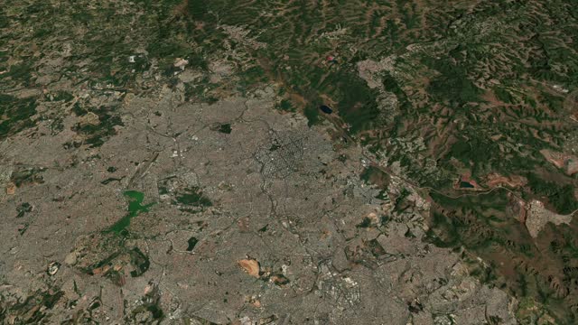 Satellite Belo Horizonte map background loop. Spinning around Brazil city air footage. Seamless panorama rotating over downtown backdrop.
