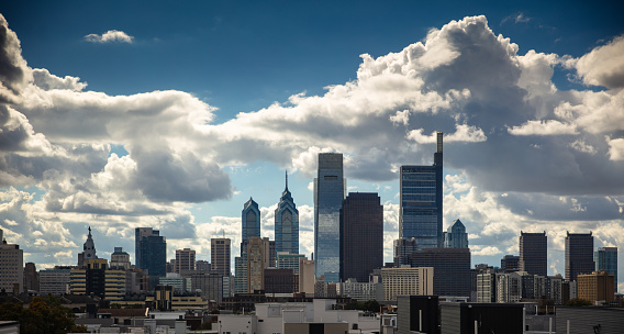 Aerial shot of the downtown Philadelphia skyline, on a cloudy day in Fall. This still image is part of a series taken at different times of day from the same location; a time lapse is also available.Authorization was obtained from the FAA for this operation in restricted airspace.