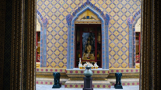 SAMUT SAKHON, THAILAND - SEPTEMBER 21: Carving art on the doors of Thai temple in Wat Bang Pla on September 21, 2015 in Samut Sakhon.