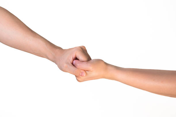 istock Two hands hold tightly together in different pose on isolated white background 1896693694