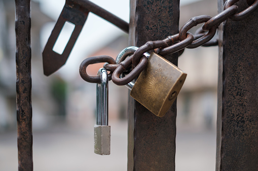 Singapore - September 4 2023: Eye Brand Lock with Gate Chains