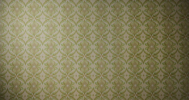 istock Old wallpaper on the wall. Old wallpaper for texture or background. 1896770081