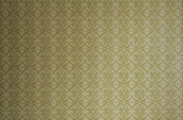 istock Old wallpaper on the wall. Old wallpaper for texture or background. 1896771110
