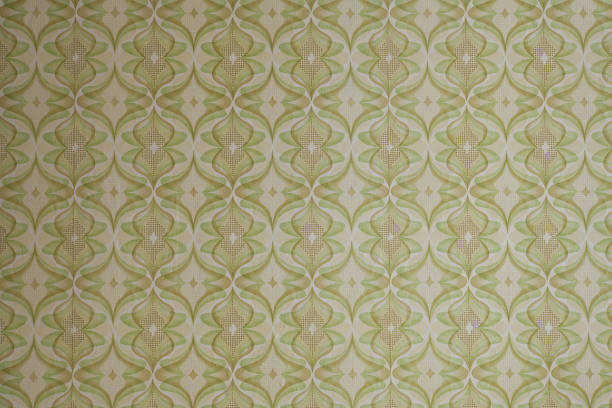 istock Old wallpaper on the wall. Old wallpaper for texture or background. 1896771123