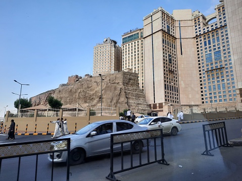 Beautiful daytime view of cars and buildings on  Prince Mohammed bin Salman street near Masjid al-Haram in Mecca.