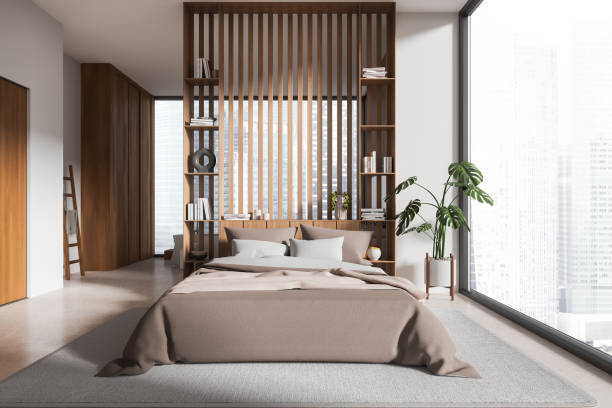 istock White and wooden bedroom and bathroom interior 1896813555