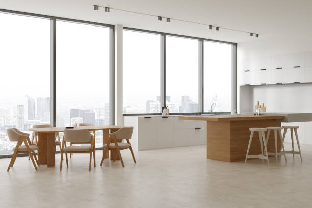 istock White home kitchen interior with bar counter and cooking corner, window 1896813621