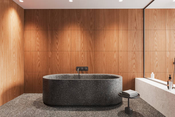 istock Luxury home bathroom interior with bathtub and glass partition 1896813939