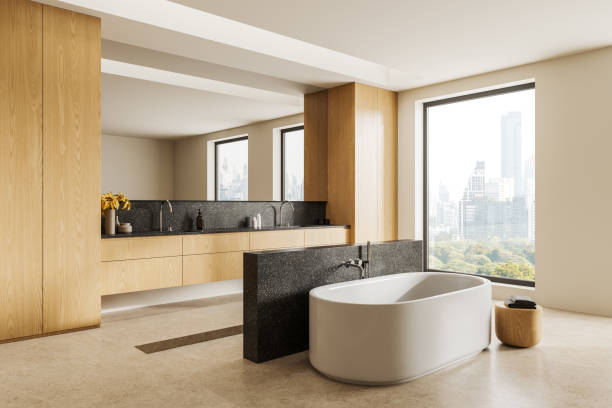 istock Modern home bathroom interior with tub and two washbasins, panoramic window 1896820725